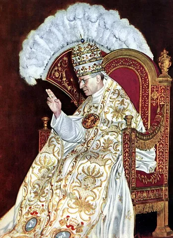 mantum: the mantle worn by the pope, which is very similar to a cope, but longer and fastened in the front...