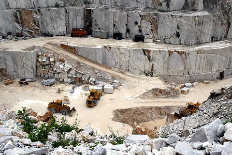 marble: a metamorphic rock of crystalline limestone