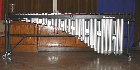 marimbaphone: a kind of percussion idiophone, like the marimba, but with either wooden or steel keys designed to...