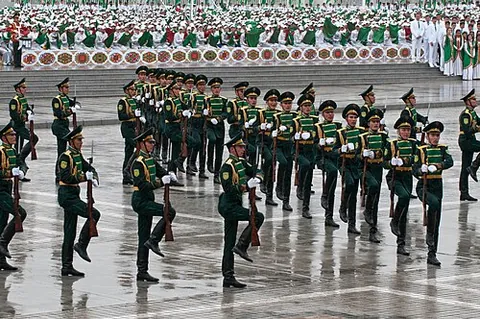mark time: to march in place, while still in step with the beat
