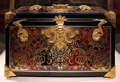 marquetry: a decorative technique in which veneers of wood, ivory, metal etc. are inlaid into a wooden surface...