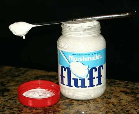 marshmallow creme: a very sweet, spreadable, marshmallow-like confection