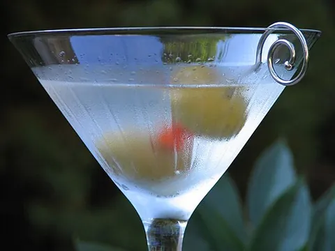 martini: a cocktail made with gin or vodka and vermouth