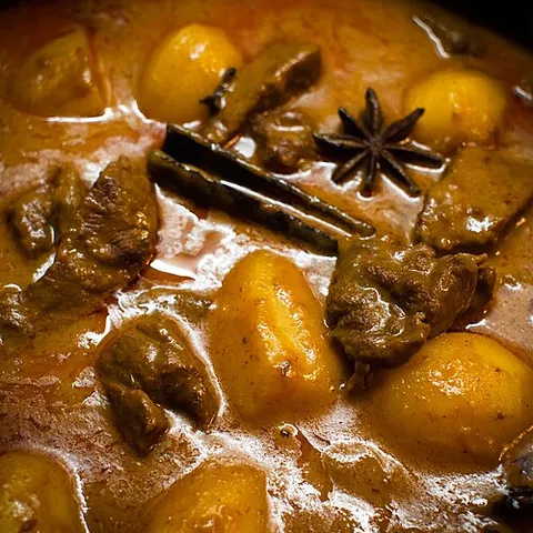 massaman: a Thai curry of Muslim origin (or the paste used to make it), usually containing coconut milk,...