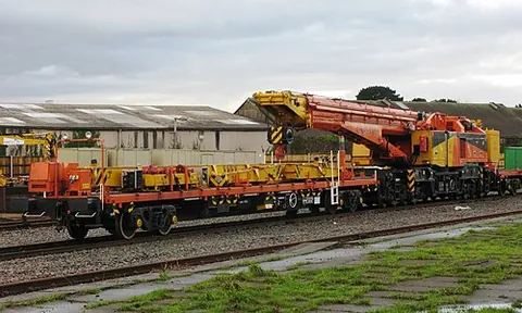 match wagon: a wagon attached to a rail-mounted crane to support the jib when the crane is being hauled in a...