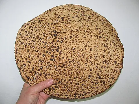 matzo: thin, unleavened bread in Jewish cuisine