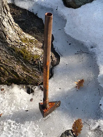maul: a heavy long-handled hammer, used for splitting logs by driving a wedge into them, or in combat