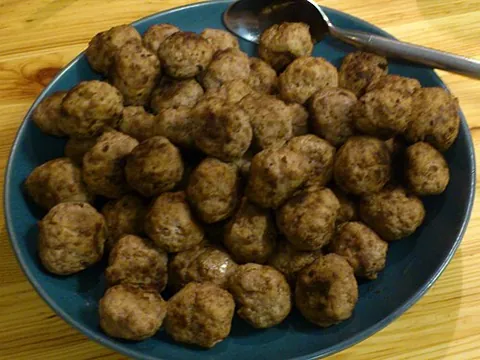 meatball: a ball of minced or ground meat, seasoned and cooked