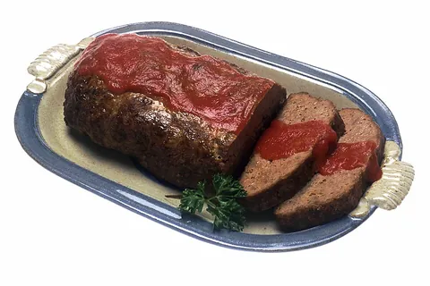 meatloaf: a dish of ground meat (usually made from ground beef, although lamb, pork, veal, venison, poultry...