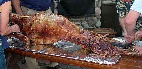 mechoui: a Maghrebi dish consisting of meat from a whole sheep or lamb spit-roasted on a barbecue