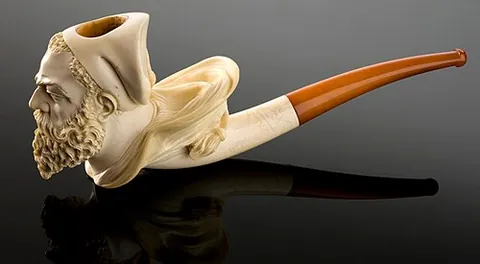 meerschaum: a soft white mineral, chiefly used for smoking-pipes and cigar holders