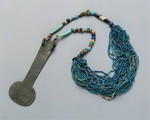 menat: in Ancient Egypt, a heavy beaded necklace and musical instrument with a crescent-shaped plate in...