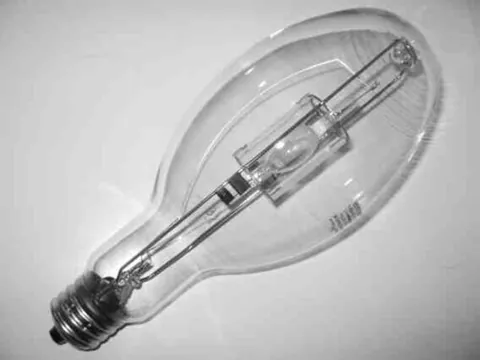 metal halide lamp: a high-pressure discharge lamp that is enclosed in a quartz envelope containing metal halides...
