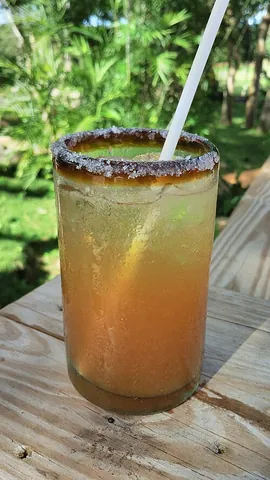 michelada: a Mexican cocktail made with beer, tomato juice, lime juice, and various assorted sauces and spices