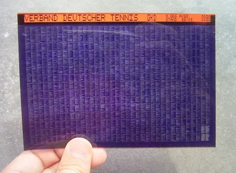 microfiche: a sheet of microfilm, six by four inches, holding several hundred reduced images of document pages,...