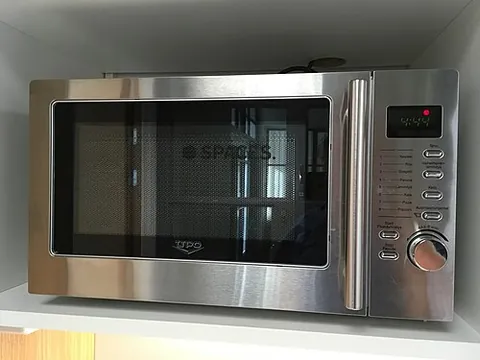 microwave: an electromagnetic wave with wavelength between that of infrared light and radio waves