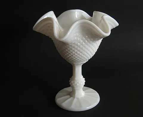 milk glass: opaque glass, especially the kind having a white shade; first produced in Italy in the 1500s as an...