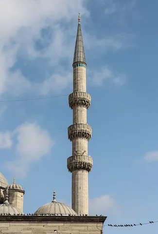 minaret: the tall slender tower of an Islamic mosque, from which the muezzin recites the adhan (call to...