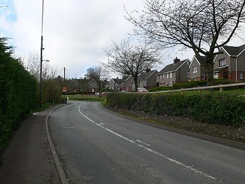 minera: a village and community in Wrexham borough, Wales (OS grid ref SJ2751)