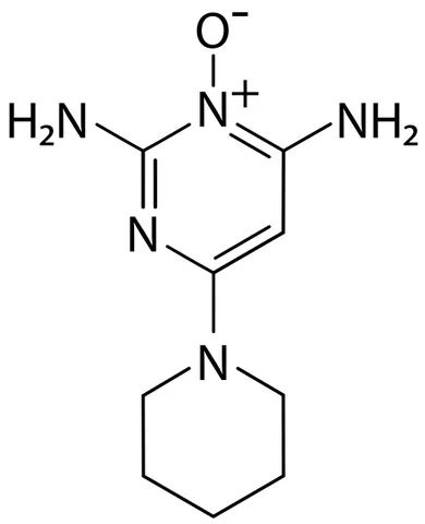 minoxidil: a compound used orally as a vasodilator to treat hypertension and topically to reverse baldness