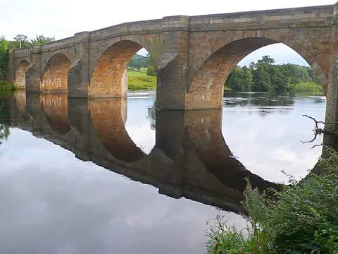mirror image: an image that is reversed from left to right, as it would appear if seen in a mirror; a reflection