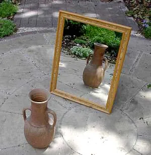 mirror: a smooth surface, usually made of glass with reflective material painted on the underside, that...