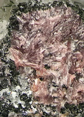 miserite: a lilac-pink or red triclinic-pinacoidal rare-earth mineral of interest also for cleaning up...