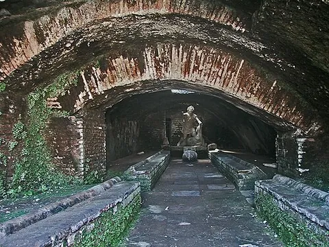 mithraeum: an ancient temple or shrine where the god Mithra was worshipped