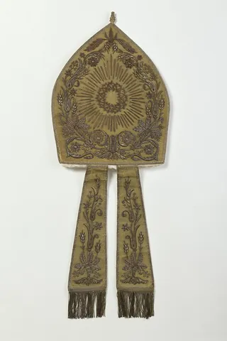 mitre: a covering for the head, worn on solemn occasions by church dignitaries, which has been made in...