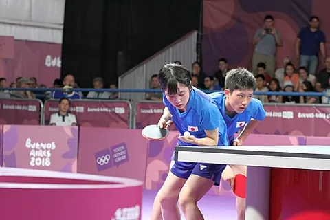 mixed doubles: a game played between two teams, each consisting of a female and a male
