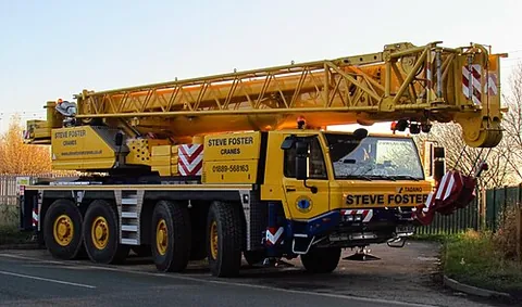 mobile crane: a crane of varying size and load capacity, usually mounted on road wheels, but sometimes on crawler...