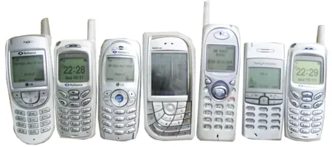 mobile phone: a portable telephone (for example, one installed in a car) that connects with the telephone...