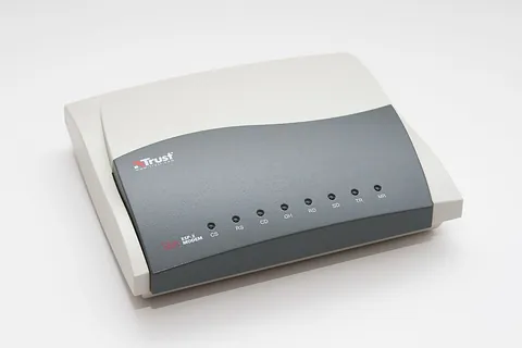 modem: a device that encodes digital computer signals into analog telephone signals and vice versa,...