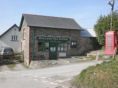 molland: a village and civil parish in North Devon district, Devon, England (OS grid ref SS8028)