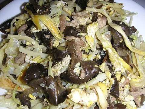moo shu: a dish of northern Chinese origin and staple of American Chinese cuisine, consisting mainly of egg,...