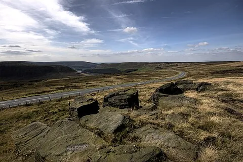 moor: an extensive waste covered with patches of heath, and having a poor, light (and usually acidic)...