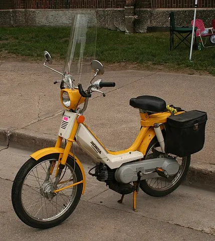 moped: a lightweight, two-wheeled vehicle equipped with a small motor and pedals, designed to go no faster...