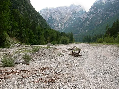 moraine: an accumulation of rocks and debris carried and deposited by a glacier