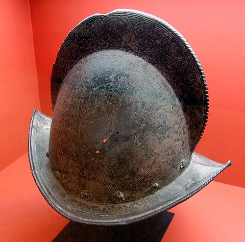 morion: a kind of open brimmed helmet used by footsoldiers in the 16th and 17th centuries, having no visor...
