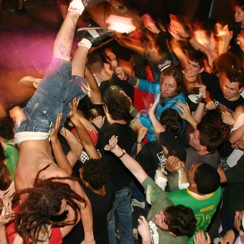 mosh: to dance by intentionally jumping into and colliding with other, similarly behaving dancers, and...