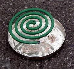 mosquito coil: a mosquito-repelling incense, usually shaped into a spiral, and typically made from a dried paste...