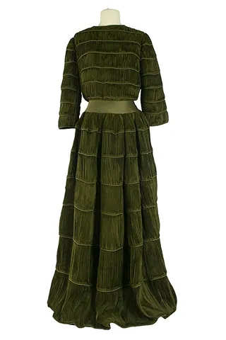 moss green: a dark green colour with a tint of yellow, like that of moss