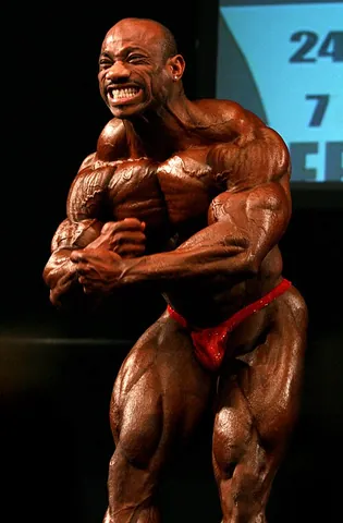 most muscular: a standard pose in which the chest, shoulder, and arm muscles are flexed with the arms in front of...