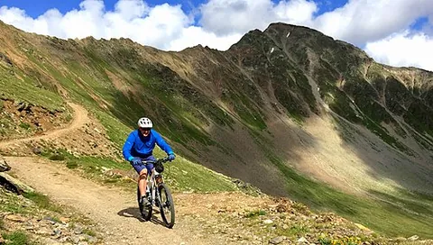 mountain biking: off-road cycling using a mountain bike