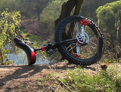 mountain unicycle: a unicycle specially designed for off-road riding, typically with a heavier frame and wider knobby...