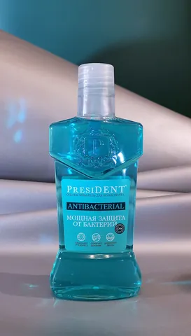 mouthwash: a liquid used to clean one's mouth