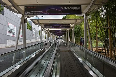 moving walkway: a slow conveyor belt that transports people horizontally or on an incline in a similar manner to an...