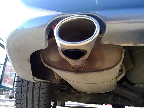 muffler: something or someone that muffles