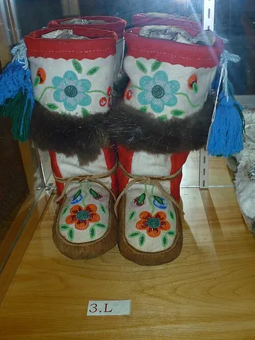 mukluk: a soft knee-high boot of sealskin or reindeer skin, originally worn by Inuit and Yupik
