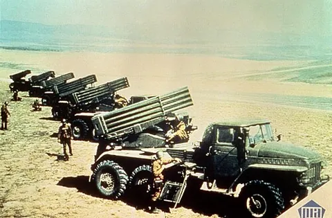 multiple rocket launcher: an artillery weapon consisting of an array of rails or tubes used to fire rockets